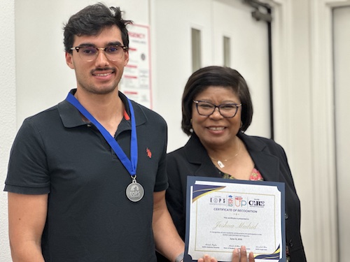 Michele LeBleu-Burns with student