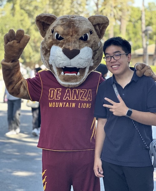 young man with Roary the mountain lion